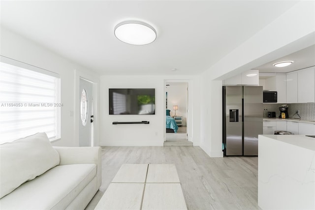 living room featuring light wood-type flooring