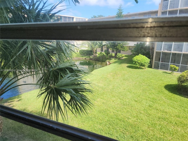 view of yard with a water view