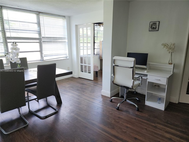 office with dark wood-type flooring