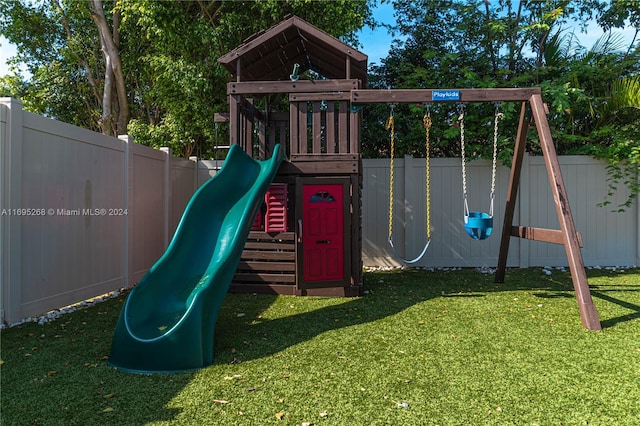 view of jungle gym featuring a yard