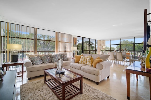 living room with floor to ceiling windows