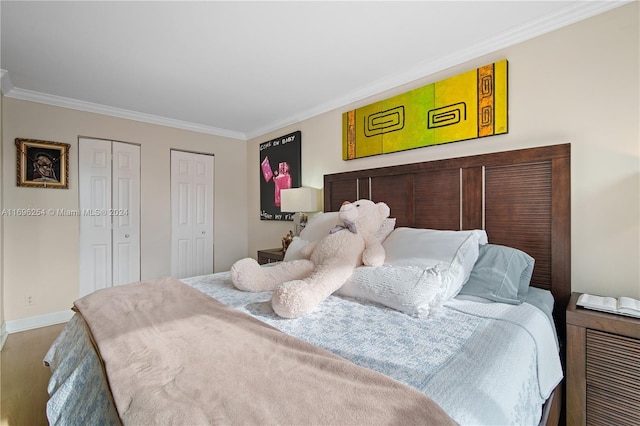 bedroom featuring crown molding