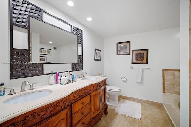 bathroom featuring vanity, toilet, and a bathtub