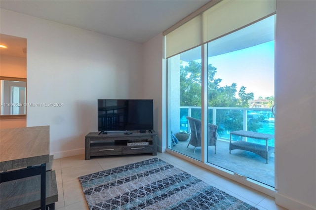 tiled living room with a multi sided fireplace