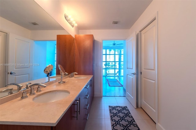 1945 S Ocean Dr Unit M5, Hallandale Beach, FL 33009 - bathroom with tile patterned floors, double vanity, and baseboards