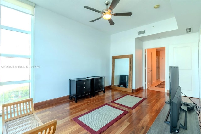 1945 S Ocean Dr Unit M5, Hallandale Beach, FL 33009 - bedroom featuring multiple windows, wood finished floors, baseboards, and a ceiling fan