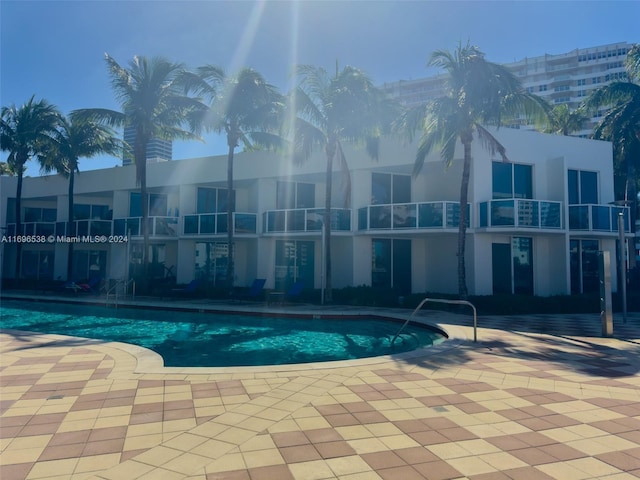 1945 S Ocean Dr Unit M5, Hallandale Beach, FL 33009 - community pool featuring a patio area