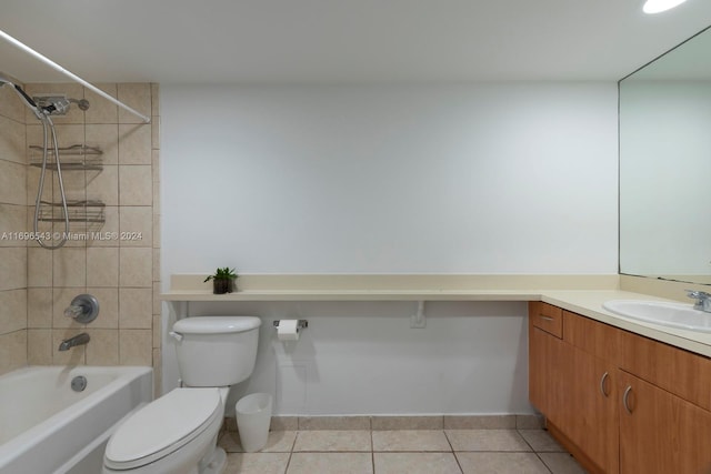 full bathroom with tile patterned flooring, vanity, toilet, and tiled shower / bath combo