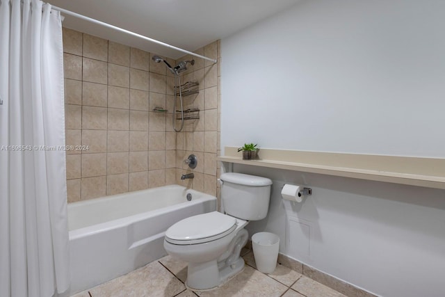 bathroom with tile patterned flooring, toilet, and shower / tub combo with curtain