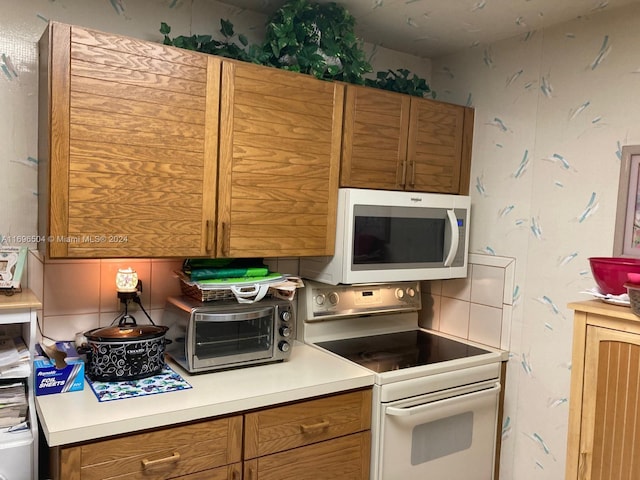 kitchen featuring white appliances