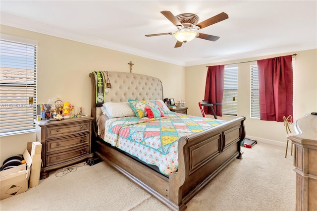 bedroom featuring ceiling fan, ornamental molding, and light carpet