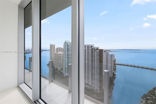 balcony featuring a water view