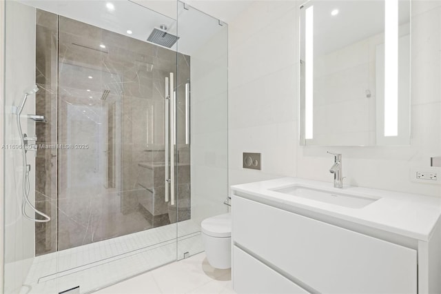 bathroom featuring toilet, recessed lighting, a shower stall, and vanity