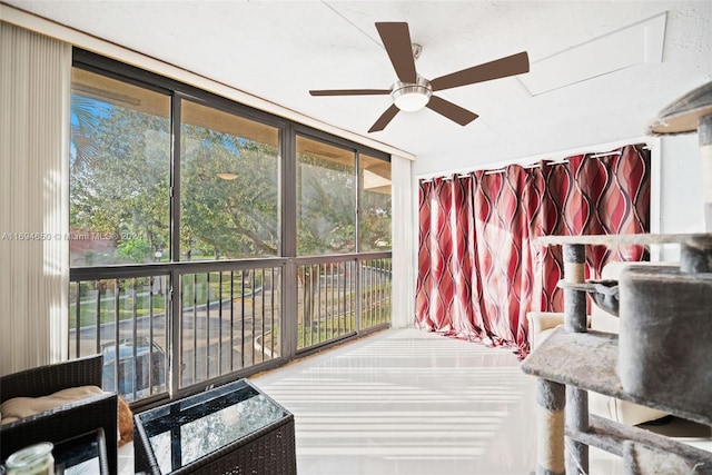 sunroom / solarium with ceiling fan