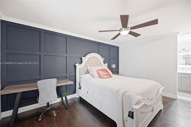 bedroom featuring connected bathroom, dark hardwood / wood-style floors, ceiling fan, and crown molding