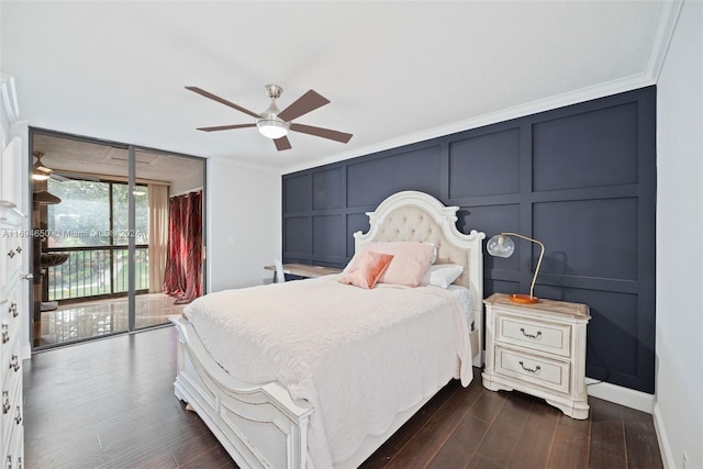 bedroom with ceiling fan, dark hardwood / wood-style floors, access to exterior, and crown molding