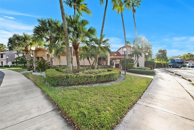 exterior space featuring a front yard