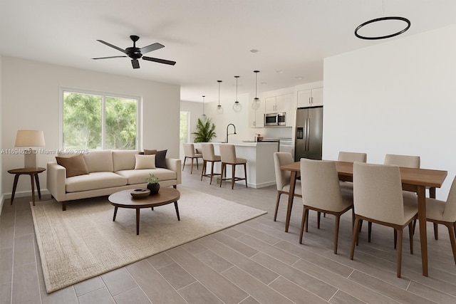 8036 104th Ct, Vero Beach, FL 32967 - living area with ceiling fan and light wood-style flooring