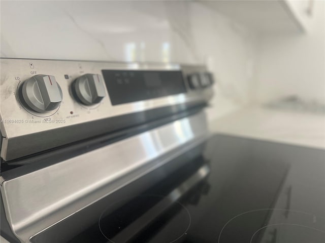 8036 104th Ct, Vero Beach, FL 32967 - kitchen view of stainless steel range with electric stovetop