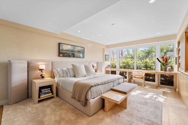 bedroom with light wood-type flooring