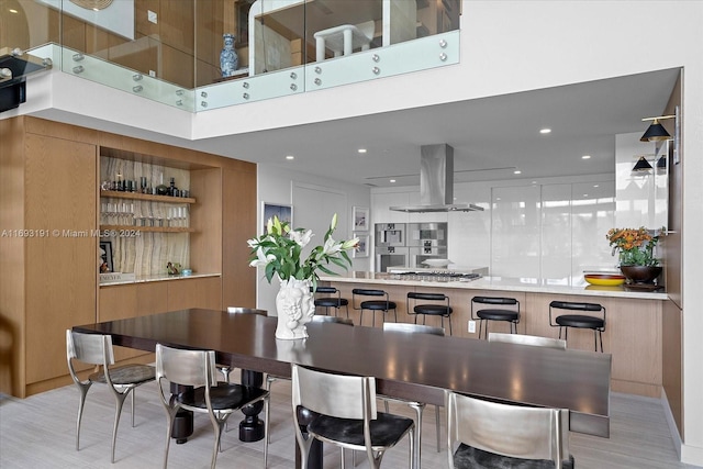 dining area featuring light wood-type flooring