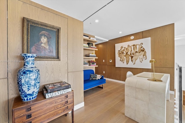 sitting room featuring light hardwood / wood-style floors