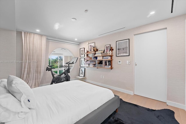 bedroom featuring light hardwood / wood-style floors