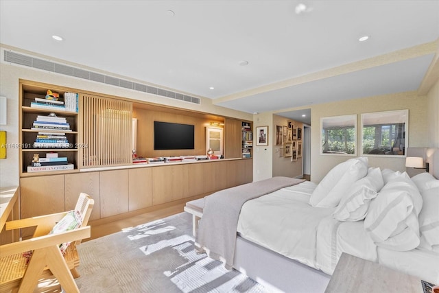 bedroom with light hardwood / wood-style floors