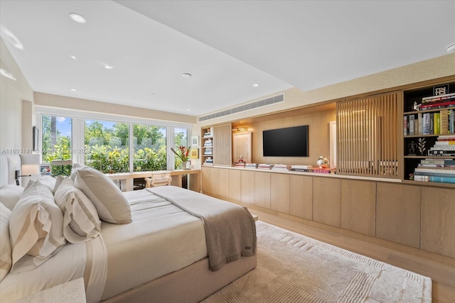 bedroom with light wood-type flooring