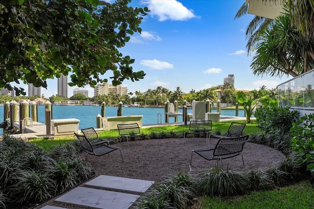 exterior space featuring a water view and a boat dock