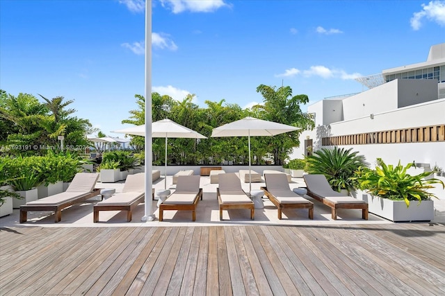 wooden terrace featuring an outdoor living space