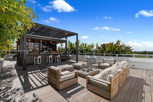 wooden terrace featuring an outdoor hangout area