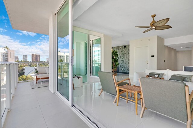 balcony featuring ceiling fan