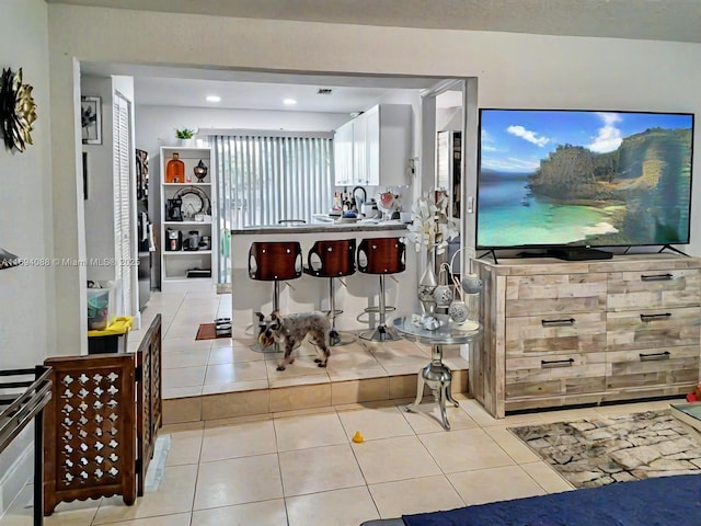 interior space featuring light tile patterned floors