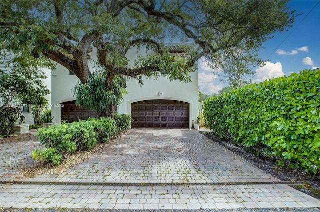 view of front of property featuring a garage