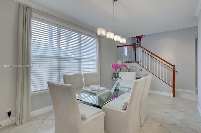 dining space with light tile patterned flooring