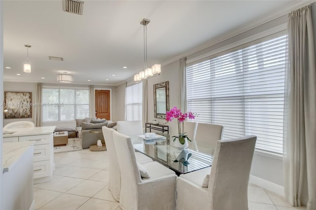 tiled dining area with crown molding