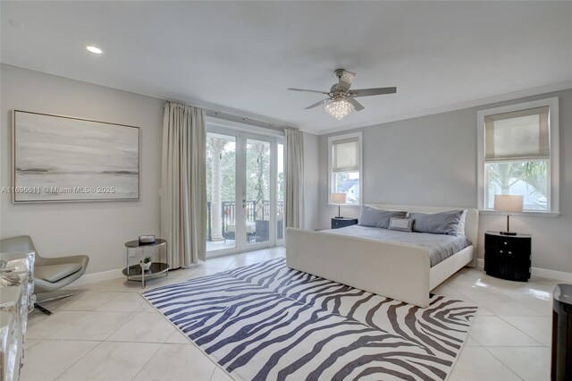 bedroom featuring ensuite bathroom, ornamental molding, light tile patterned floors, and ceiling fan