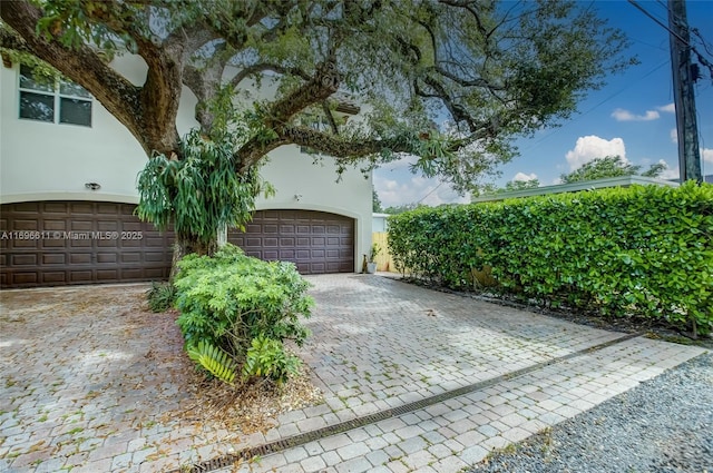 exterior space featuring a garage