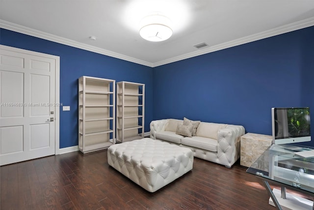 living room with dark hardwood / wood-style flooring and ornamental molding