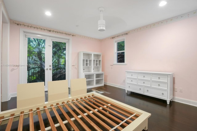 unfurnished bedroom featuring dark hardwood / wood-style flooring