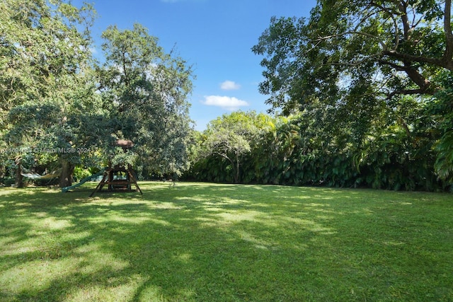 view of yard featuring a playground