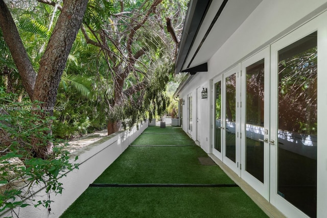 view of yard featuring french doors