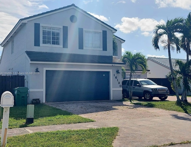 view of property featuring a garage