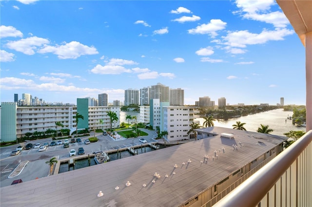 exterior space featuring a view of city and a water view