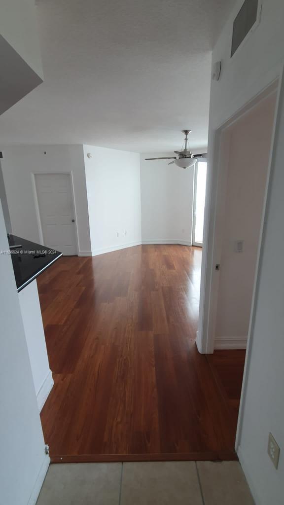 hall featuring hardwood / wood-style flooring