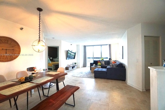 dining space featuring expansive windows