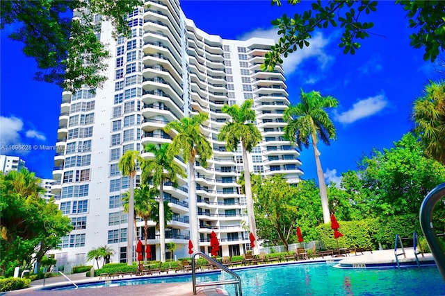 view of pool featuring a patio area