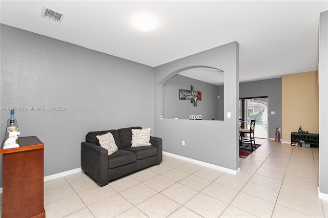 living area with light tile patterned floors