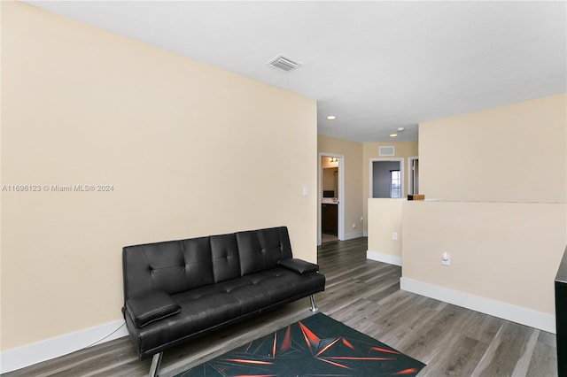 living area featuring hardwood / wood-style flooring